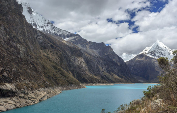 Turquoise lake in the andes mountains in peru