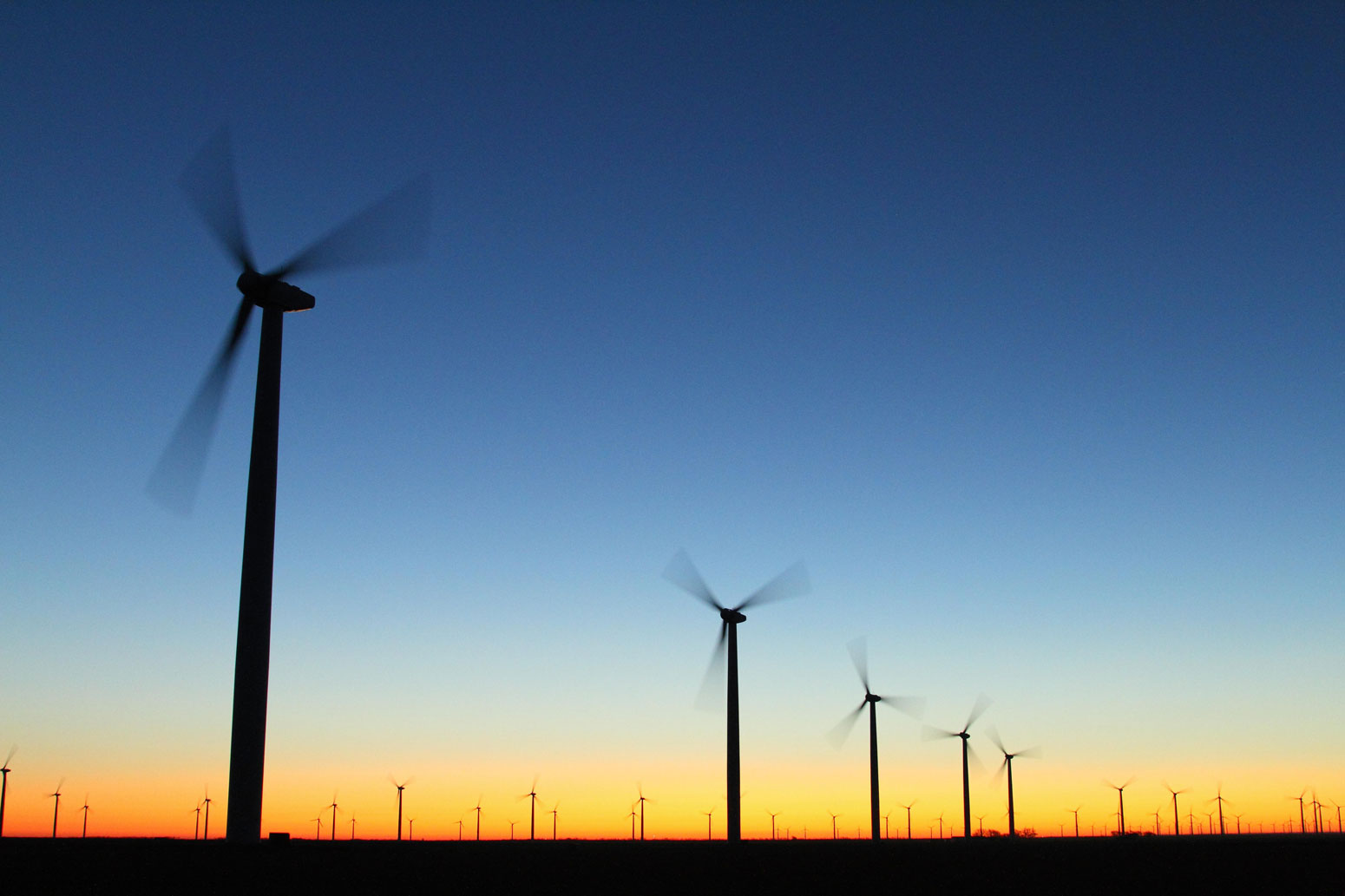 Wind turbines at renewable power generation farm in Texas