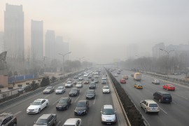 Smog over the traffic in Beijing, China