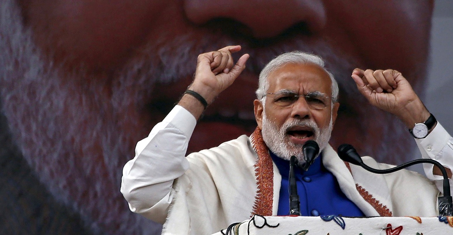 India's Prime Minister Narendra Modi addresses a rally in a cricket stadium in Srinagar