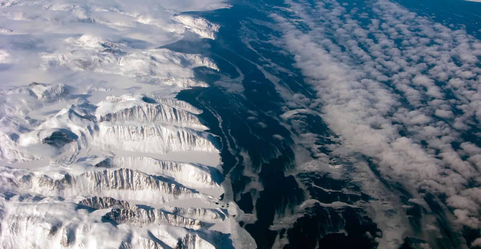 Aerial view of the Greenland gulf with mountain and ocean