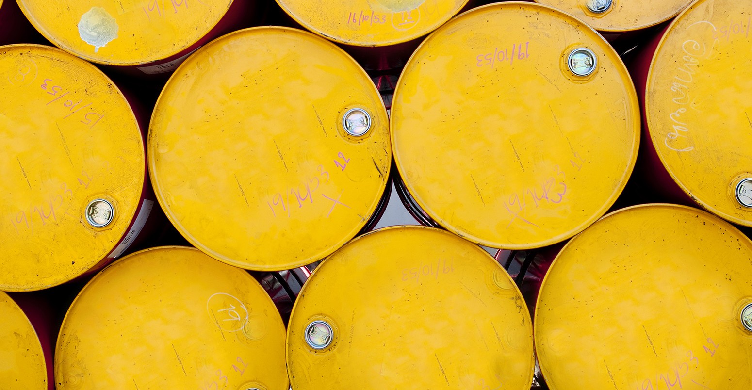 Stacked yellow oil barrels