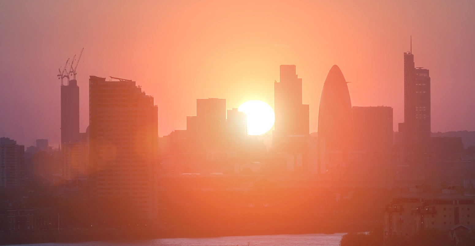 View of City of London's high rise architecture at sunset.
