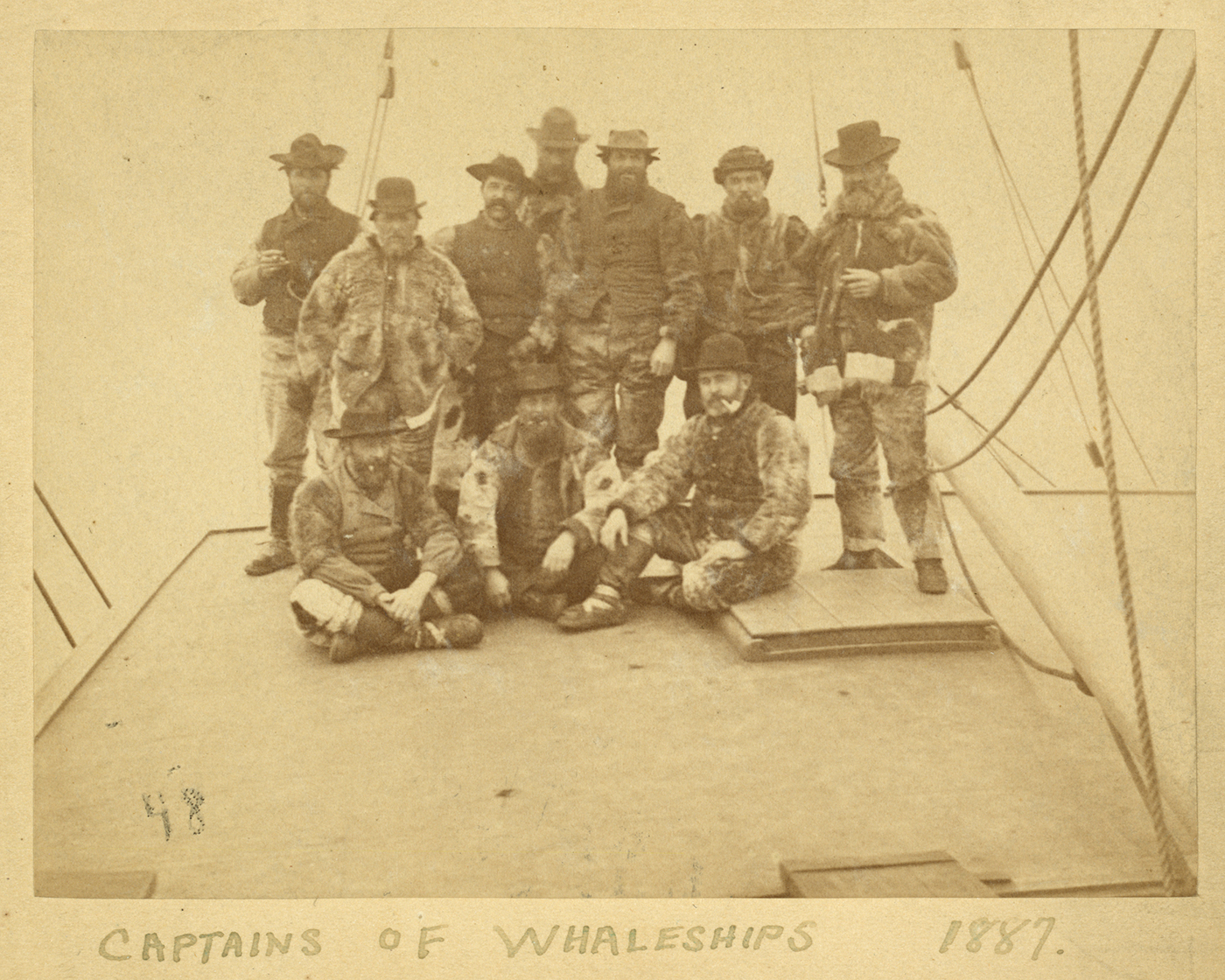 Sepia photo of whaling Captains of Whaleships in Arctic dress