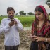 Farmers receive updates on climate smart practices on their phones, as part of an adaptation project in Karnal, India