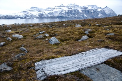 A cabin door from a WWII outpost lies on the permafrost in Greenland