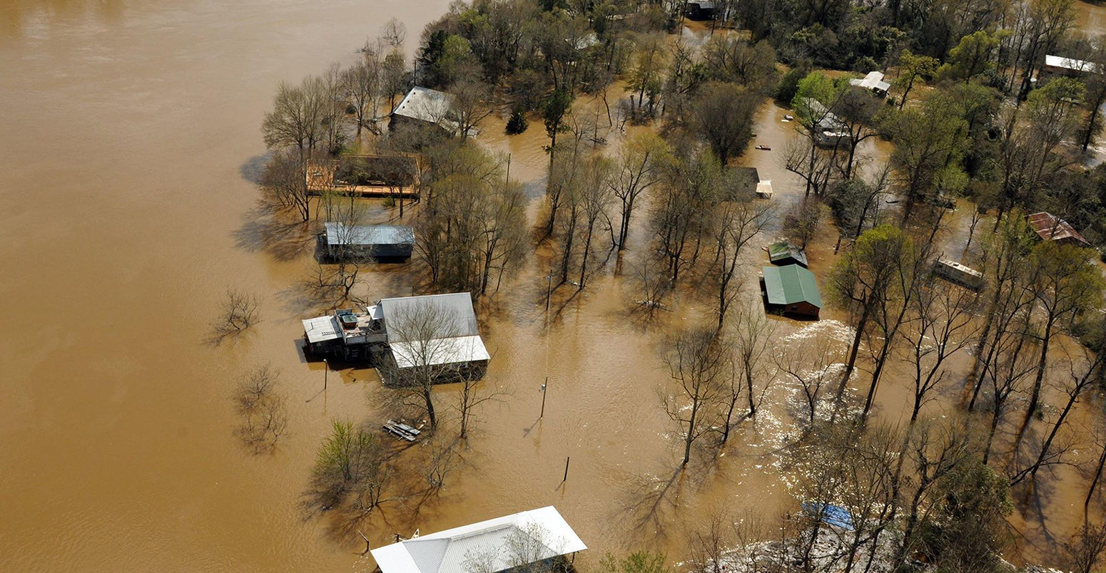 FNYKY6 Aerial view of homes submerged in floodwaters along the Pearl and Leaf Rivers after record breaking storms dumped rain across the deep south March 13, 2016 in St. Tammany Parish, Louisiana.