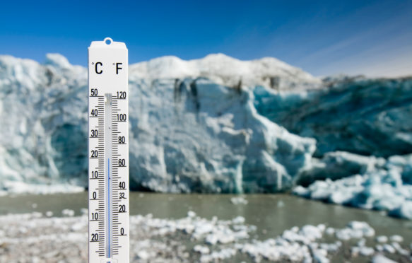 温度计将空气温度乘坐坎格鲁苏阿克（Kangerlussuaq Greenland）附近的罗素冰川