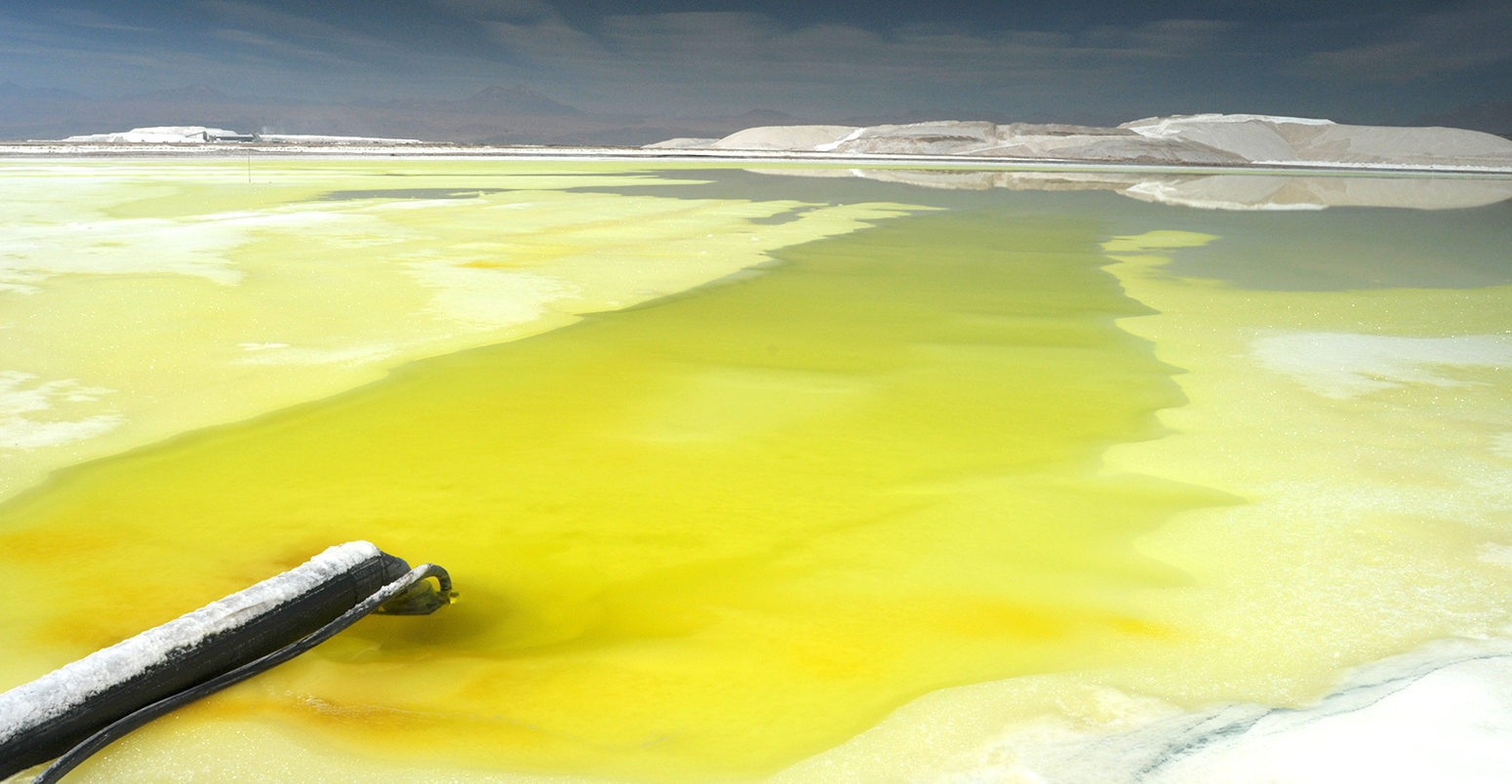A pond to extract lithium from salt in Atacama Desert, North of Chile. Credit: Diego Giudice / Alamy Stock Photo. BNKX1X