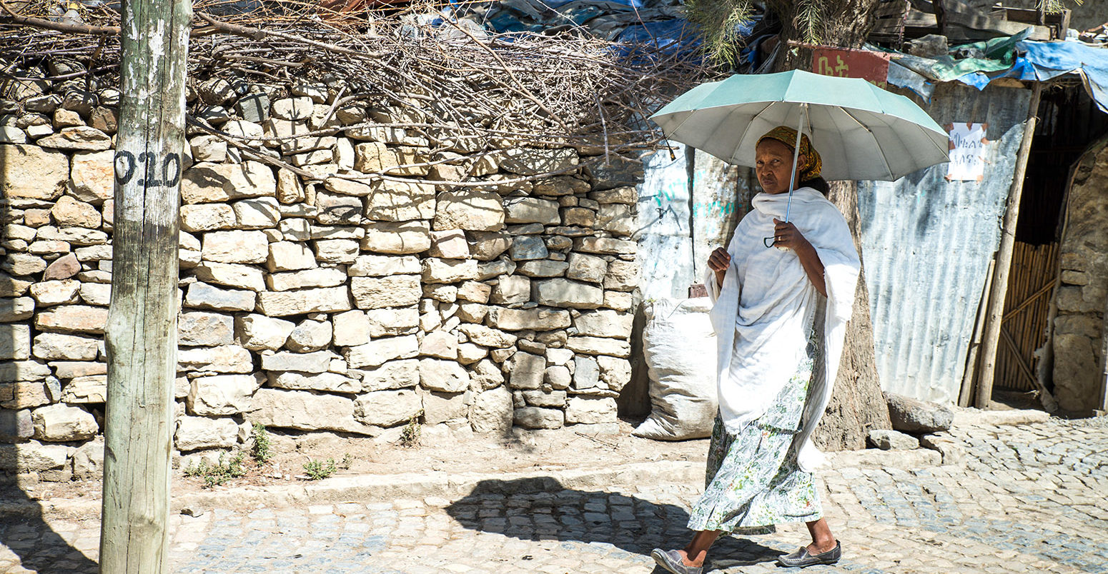 Protecting from the sun, Mekelle, Ethiopia. Credit: Ivoha / Alamy Stock Photo. EE4NFR