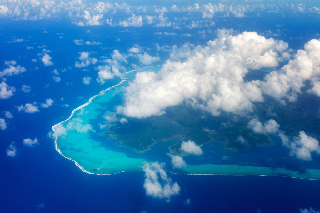 DDW64M View of Raiatea from the air with clouds. French Polynesia