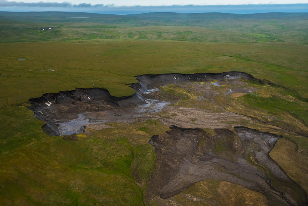 MYE111 A massive permafrost thaw slump near the Arctic Ocean coastline.