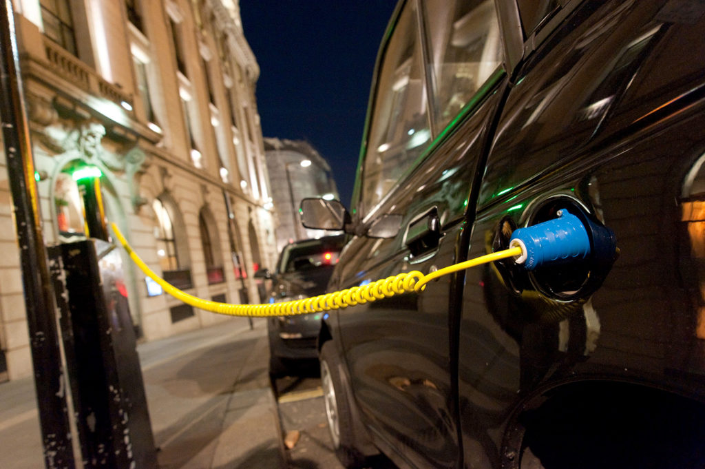 Electric car charging at a Juice Point, London, UK. Credit: Alex Segre / Alamy Stock Photo. BG9KAE