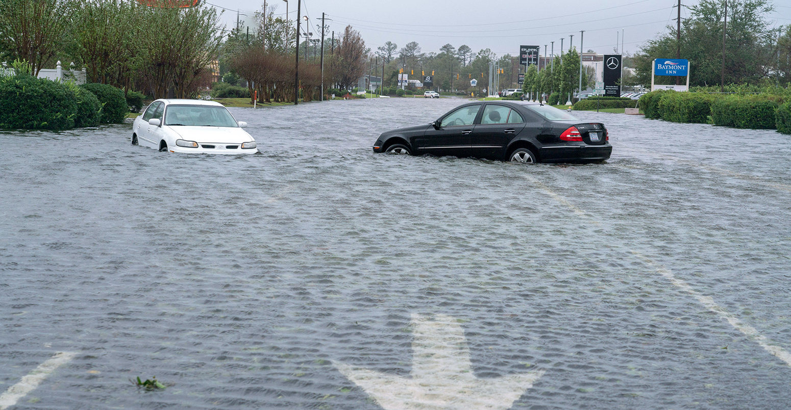 PKTMFJ Wilmington, United States. 15th Sep, 2018. Cars sit abandoned on a street during Hurricane, now tropical storm Florence September 15, 2018 in Wilmington, North Carolina. Tropical storm Florence is expected to drop more rain over the next few days and cause more flooding along North and South Carolina. Some rivers are expected to crest on Monday. Credit: Ken Cedeno/UPI Photo/Newscom/Alamy Live News