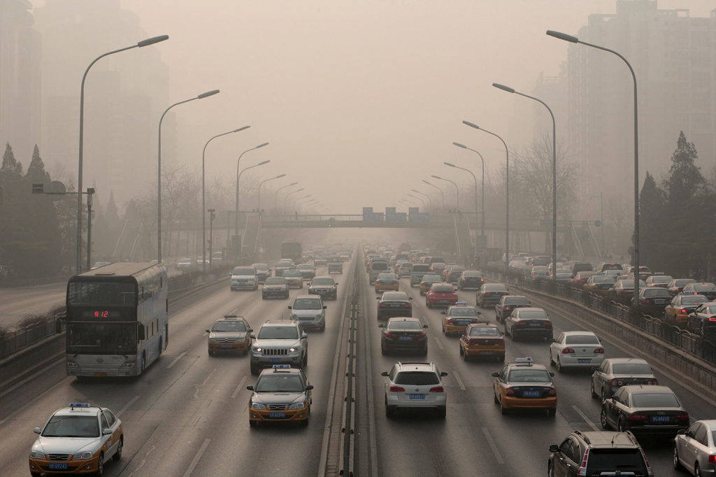 Heavy pollution over the second ring road on the east side of Beijing. Credit: David Gourhan / Alamy Stock Photo. HEG233