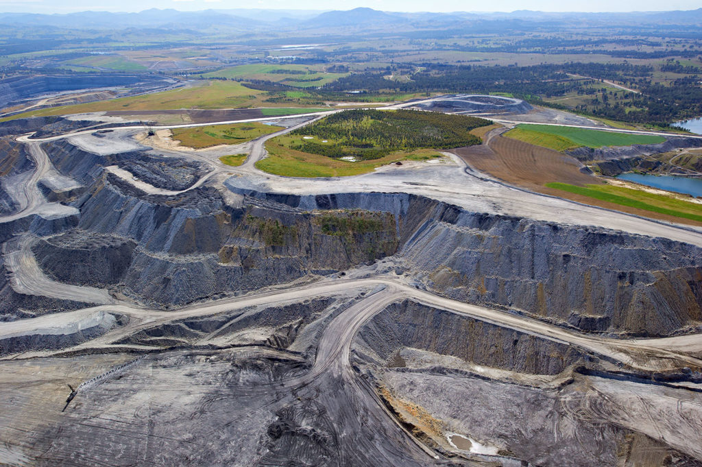 Aerial view of an open cut coal mine in Hunter Valley, New South Wales, Australia. Credit: redbrickstock.com / Alamy Stock Photo. C2MEXD