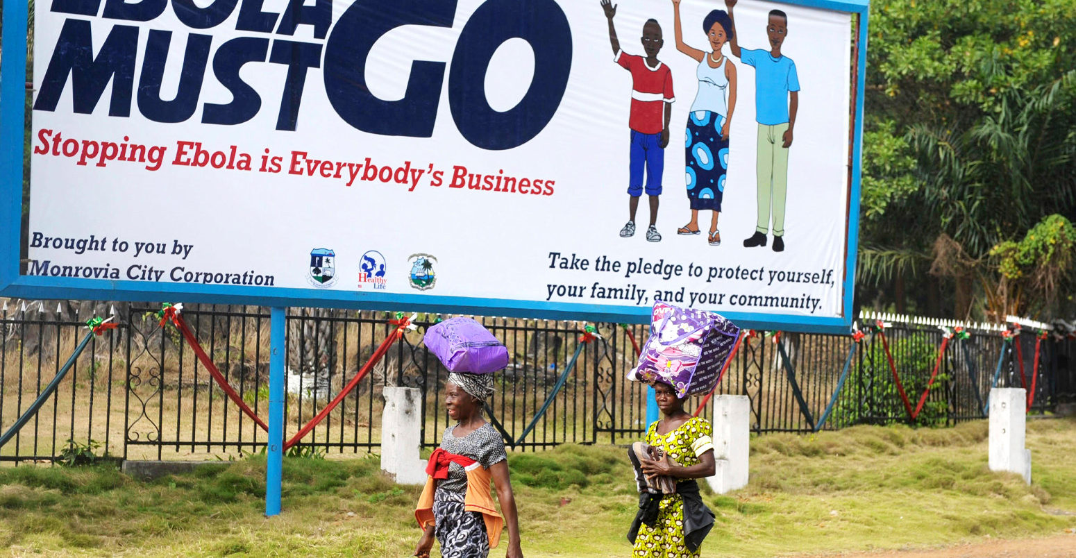 A public service billboard asking everyone to help stop the Ebola outbreak, 15 January 2015, in Monrovia, Liberia. Credit: UNMIL / Alamy Stock Photo. F155K4
