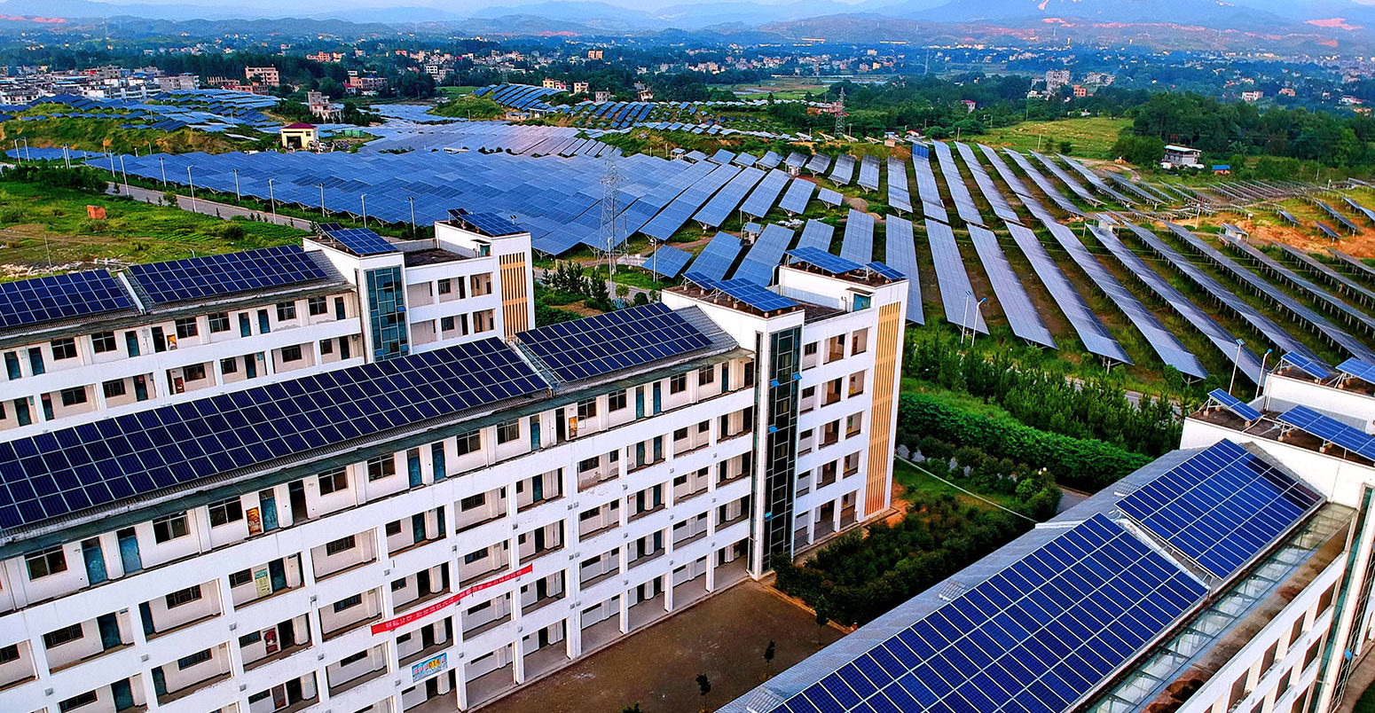 Rooftop solar panels in Changjiang village, China. Credit: Imaginechina Limited / Alamy Stock Photo. WA9NTN