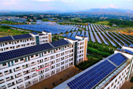 Rooftop solar panels in Changjiang village, China. Credit: Imaginechina Limited / Alamy Stock Photo. WA9NTN