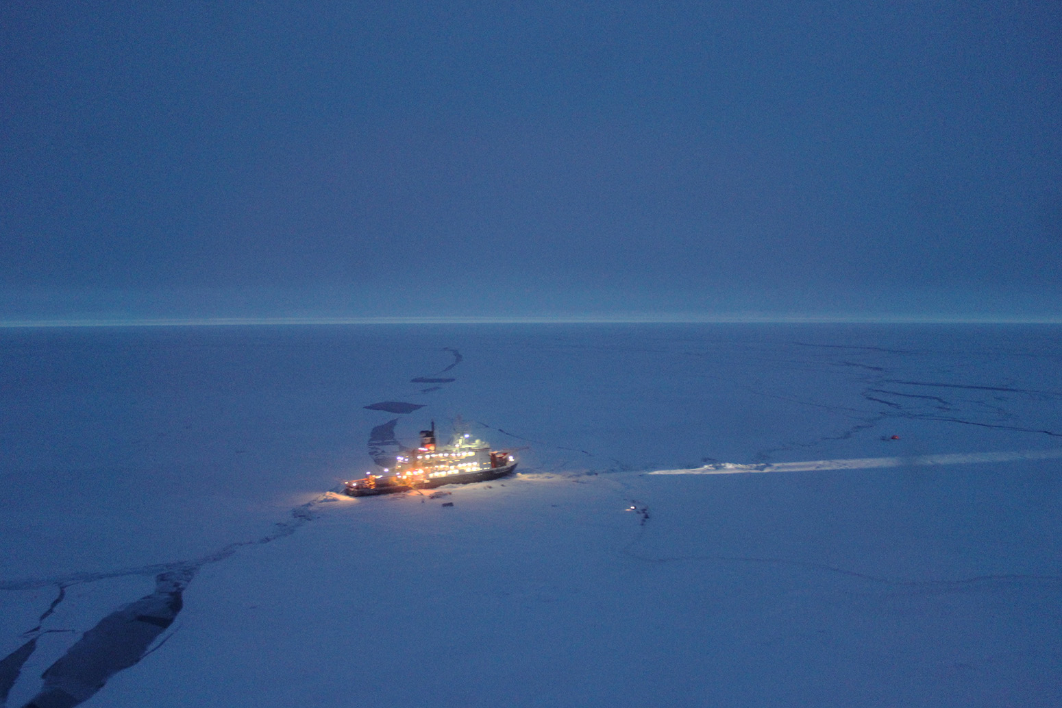 The Polarstern moored to an ice floe in the Central Arctic Ocean, as viewed from the window of an Mi-8 helicopter.