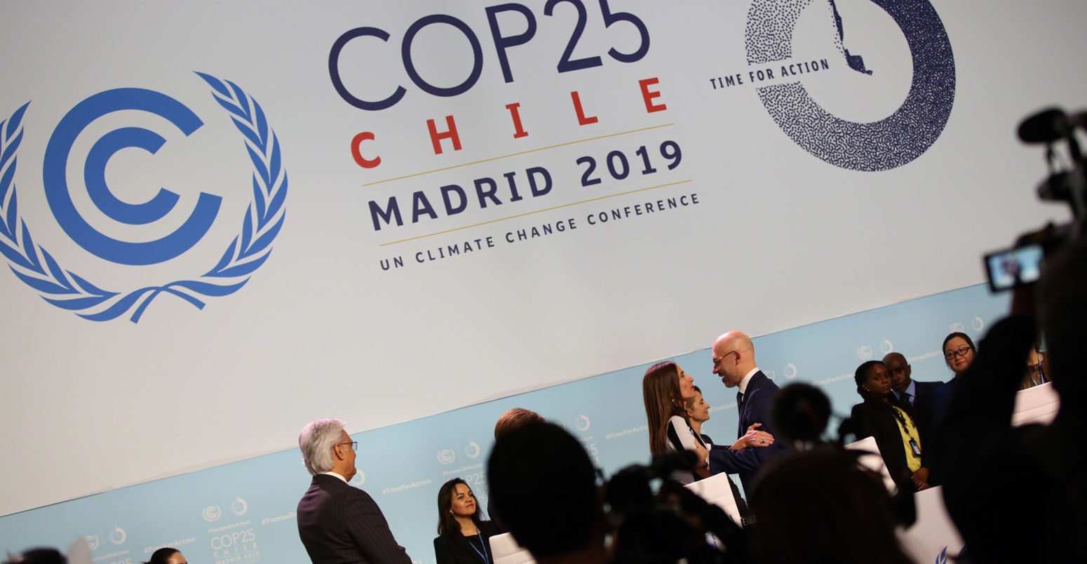 Michał Kurtyka, COP 24 President, Poland, welcomes Carolina Schmidt, COP 25 President, Chile, to the podium to take over the presidency.