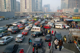 Traffic in Beijing, China. Credit: Lou-Foto / Alamy Stock Photo. CFKCFE