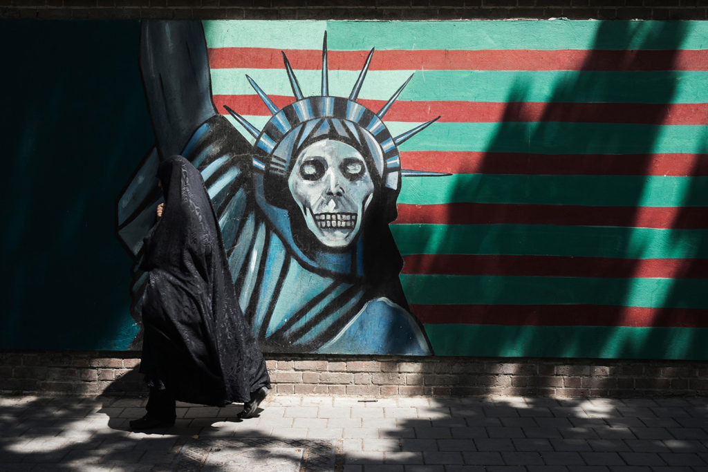Anti-American mural on the wall of the former US Embassy. Credit: Rutger Klevenfeldt / Alamy Stock Photo. FBN6RB