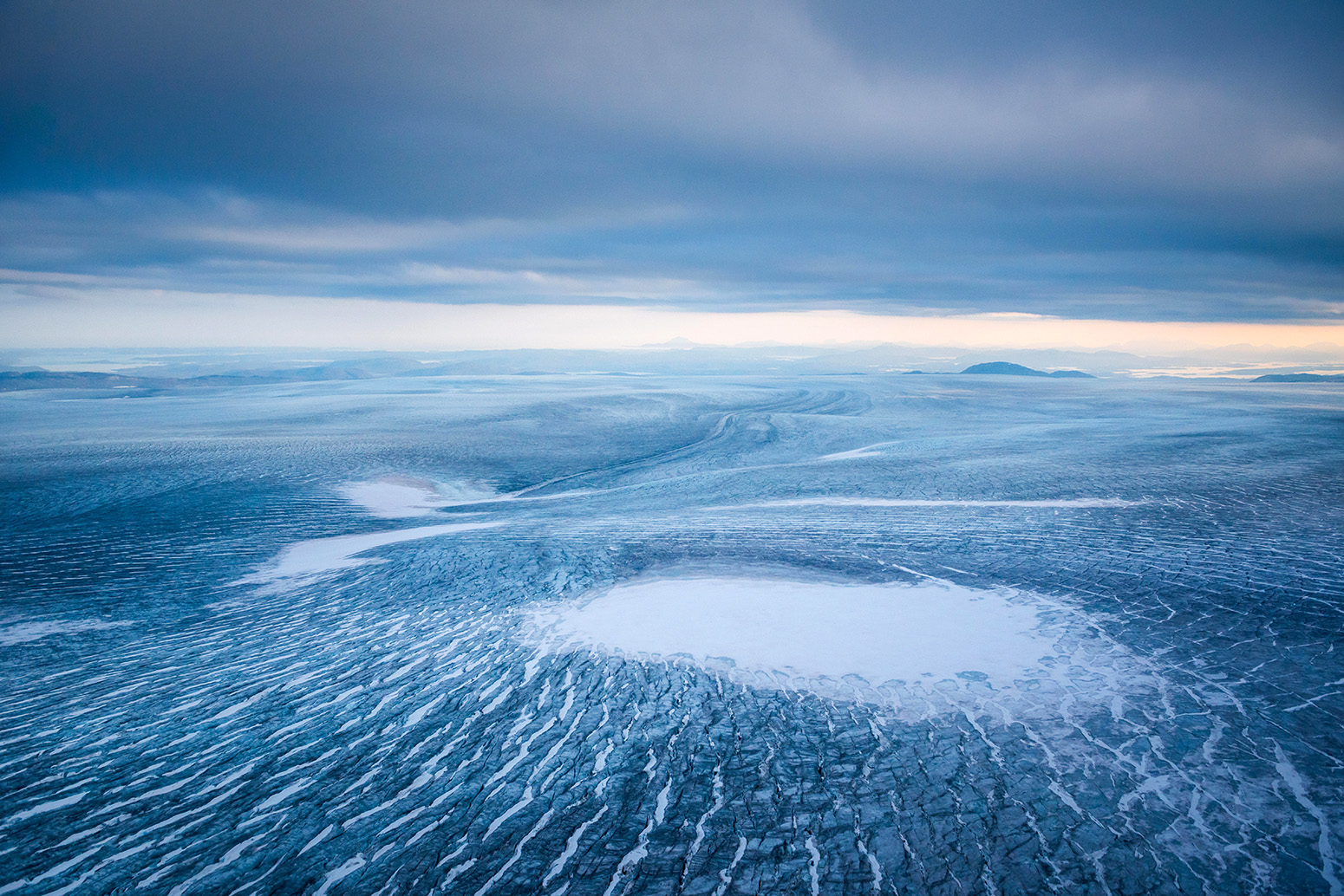 Aerial view of the Greenland ice sheet. Credit: imageBROKER / Alamy Stock Photo. KXAJ2W