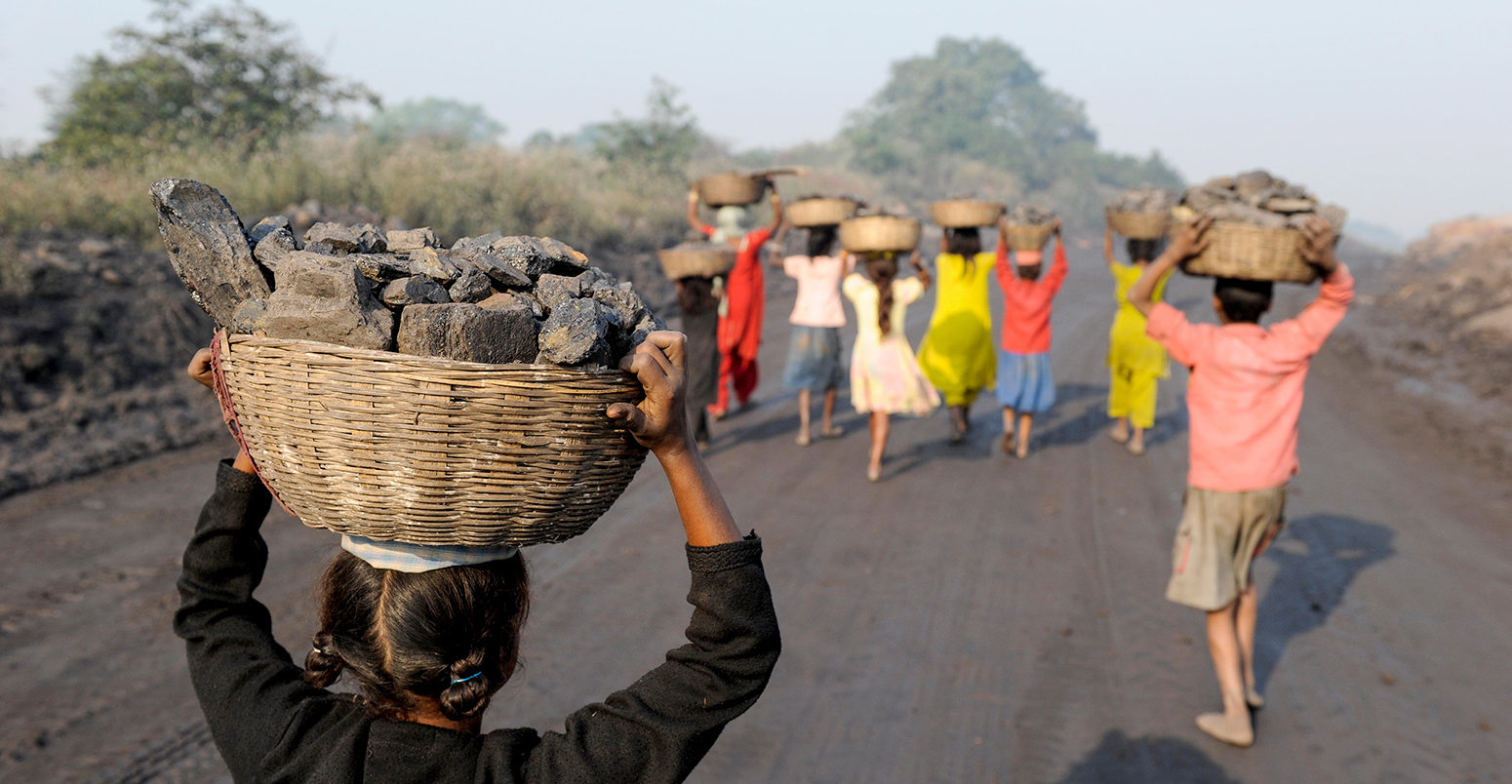 Coal remains are collected to be sold at a local market, Jharkhand, India. Credit: Joerg Boethling / Alamy Stock Photo. HN5KMY