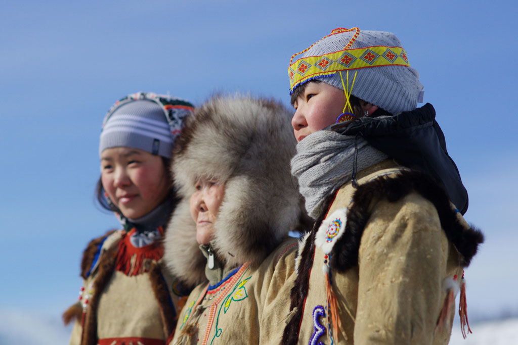Even people in traditional furcloths at reindeer race, Topolinoe village, Verkhoyansk mountains.