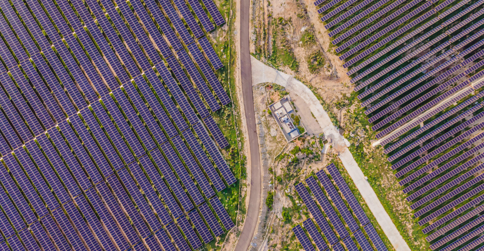 Aerial view of solar panels in a solar farm in Thailand.