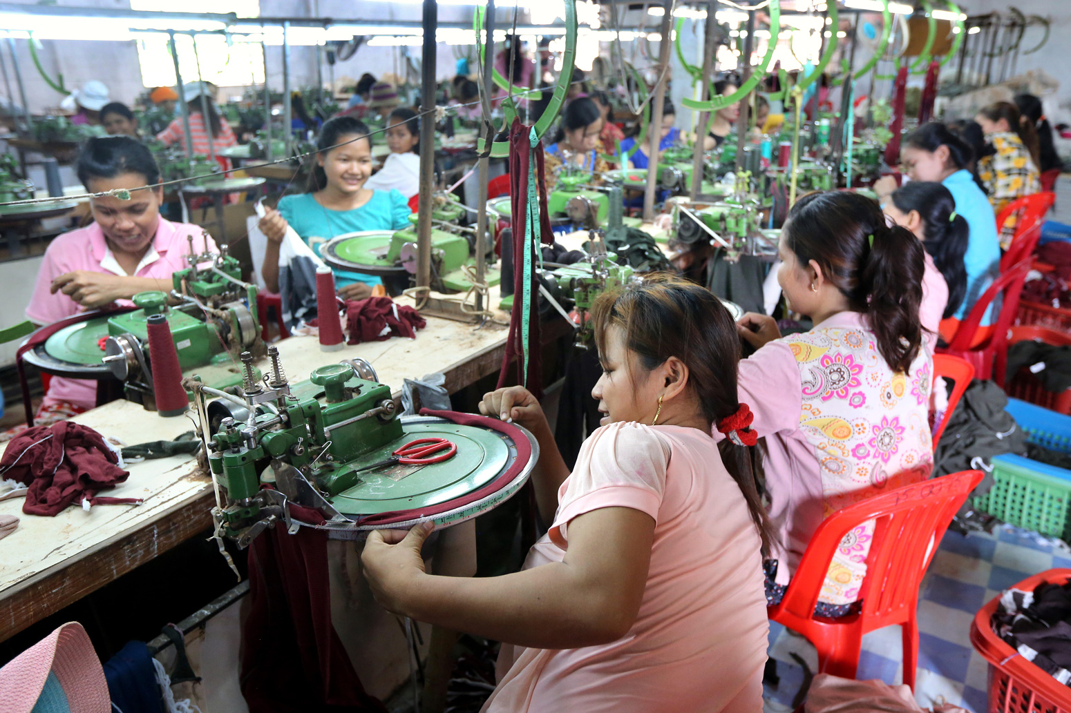Female workers in a chinese operated textile factory in Thanaut Tee village, Takeo province, Cambodia, Asia. Credit: Friedrich Stark / Alamy Stock Photo