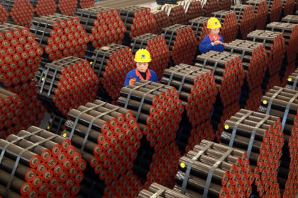 Factory workers in Tongcheng, China, on 17 November 2020. Credit: Costfoto / Alamy Stock Photo.