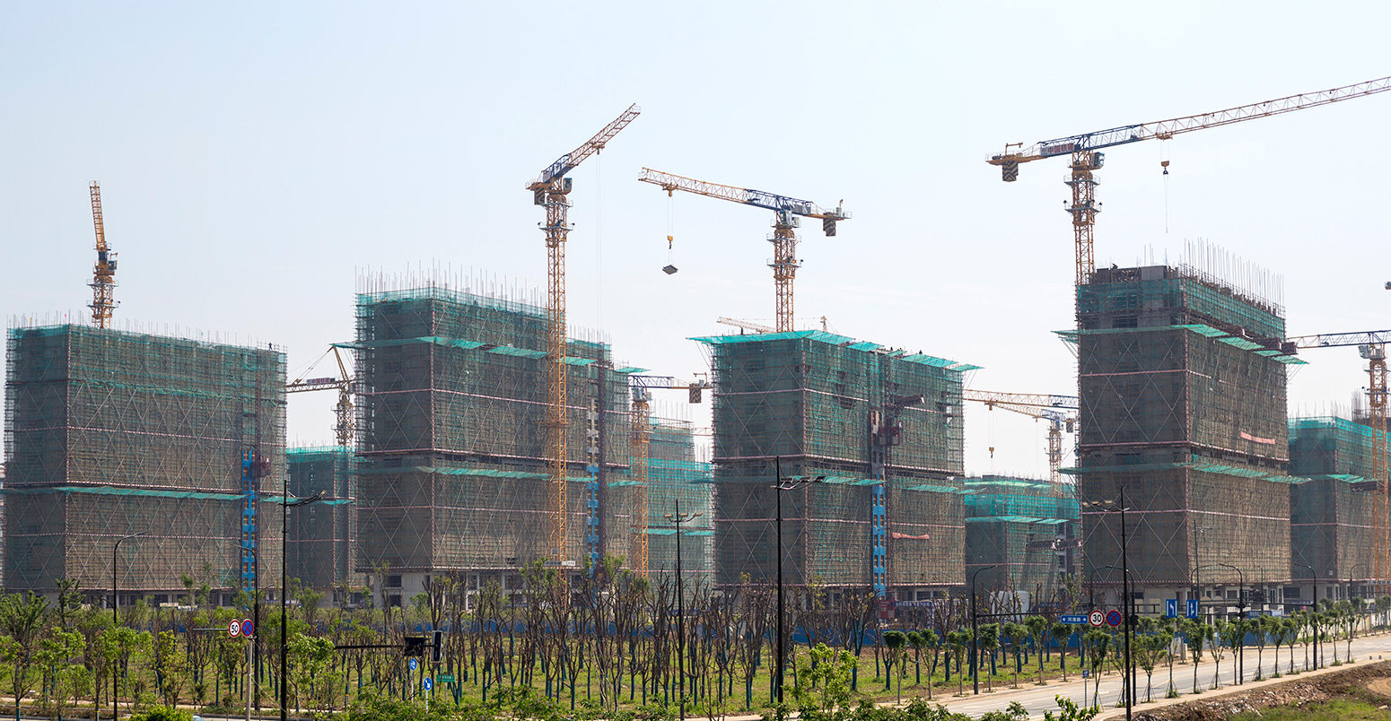 New apartments under construction in Yangzhou, Jiangsu, China. Credit: Charles O. Cecil / Alamy Stock Photo.