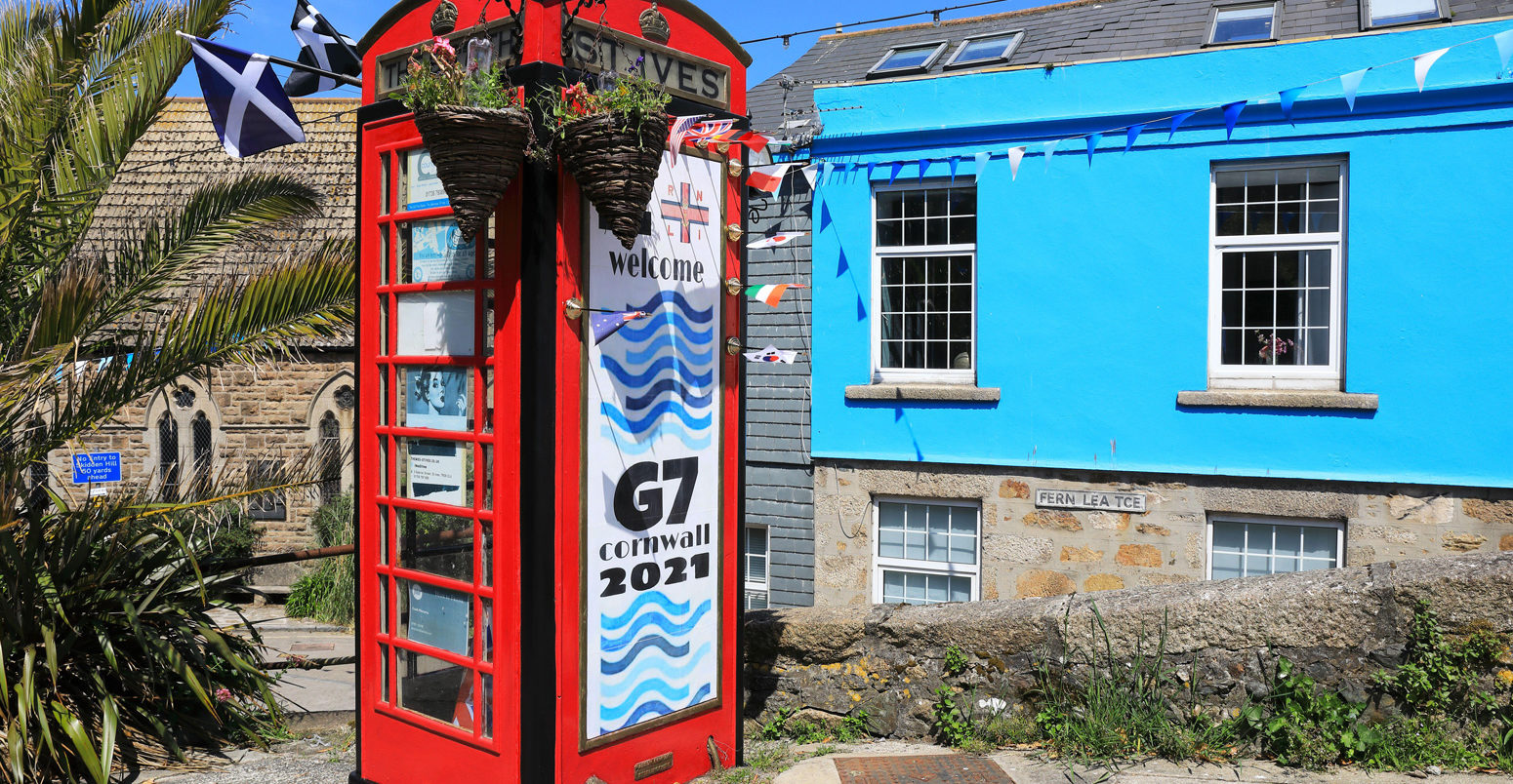 Red phone box in St Ives, decorated to welcome the G7 summit to Cornwall