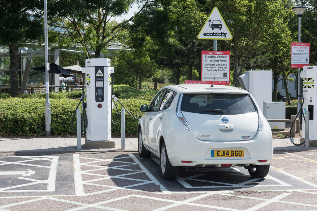 Nissan Leaf at Ecotricity charging point at motorway services