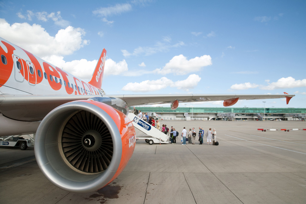 Passengers boarding an EasyJet plane at Stansted Airport
