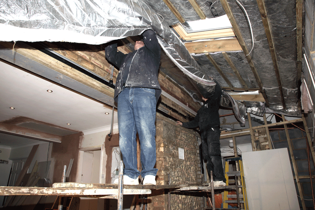 Installation of foil roof insulation in a domestic property in England
