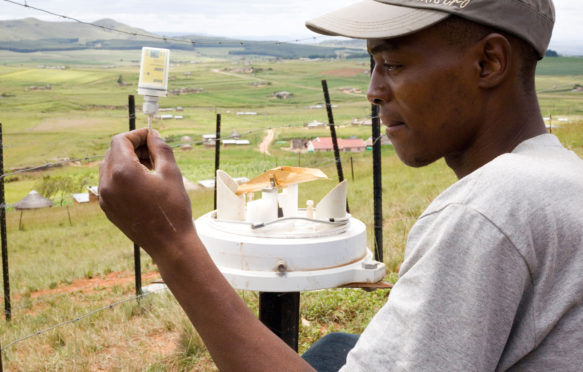 Rain guage with digital data collection device, South Africa