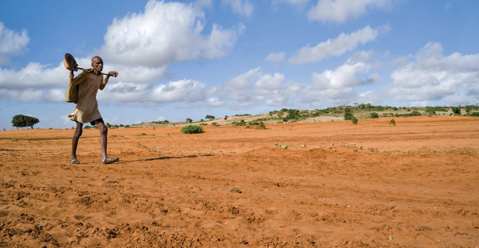 A man walking in the dried-out field in Andranosira