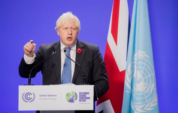 英国总理鲍里斯·约翰逊（Boris Johnson）在格拉斯哥的COP26举行的新闻发布会上发表讲话