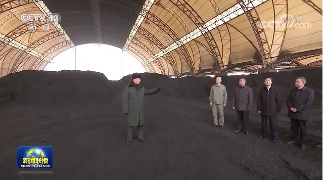 Xi Jinping inspecting the coal warehouse of a thermal power company in Shanxi province