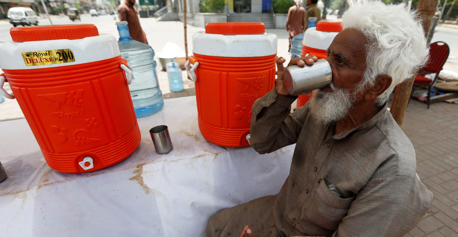 A water distribution point during a heatwave in Karachi, Pakistan.