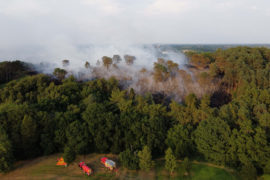Firefighters respond to a large wildfire at the edge of Birmingham, UK during the July 2022 heatwave