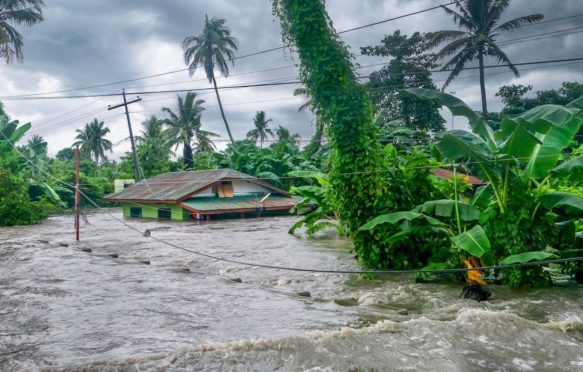 不断上涨的水位淹没房子蒙斯那么重oon rains cause major floods in Philippines