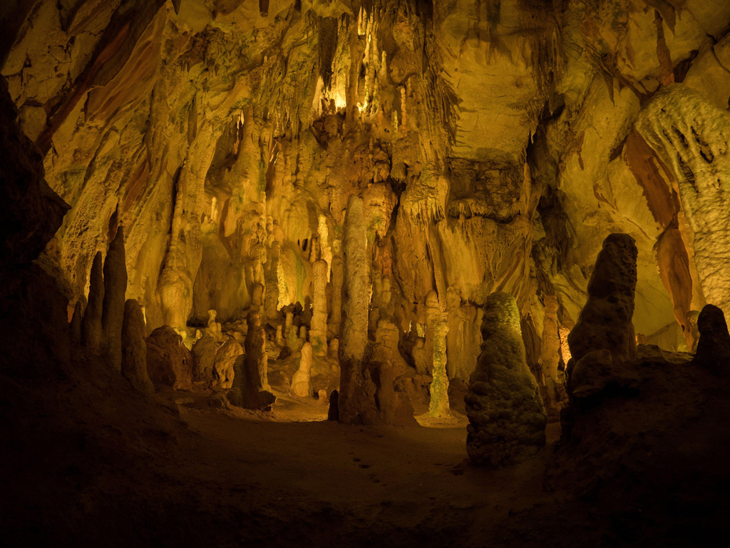 Stalagmites and stalactites inside Grutas da Moeda cave in Portugal
