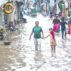 Flooded road at Badami Bagh vegetable market after heavy monsoon in Lahore, Pakistan, 14 July 2022. Credit: REUTERS / Alamy Stock Photo.