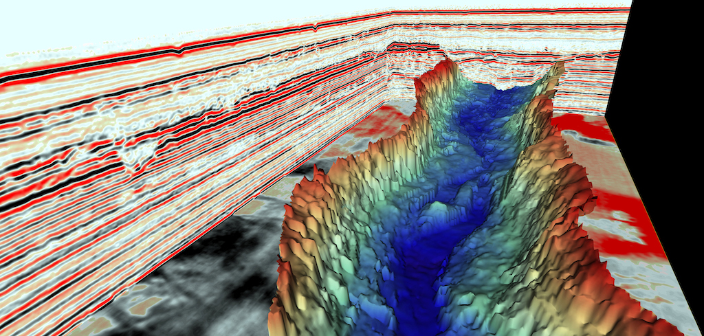 A giant tunnel valley, now buried 200 metres beneath the bottom muds of the North Sea, revealed in 3D using seismic data. The tunnel valley is about 1km wide and 120 metres deep.