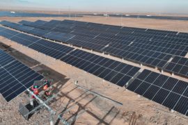 Installation of photovoltaic panels at the solar power generation project in Zhangye, China.