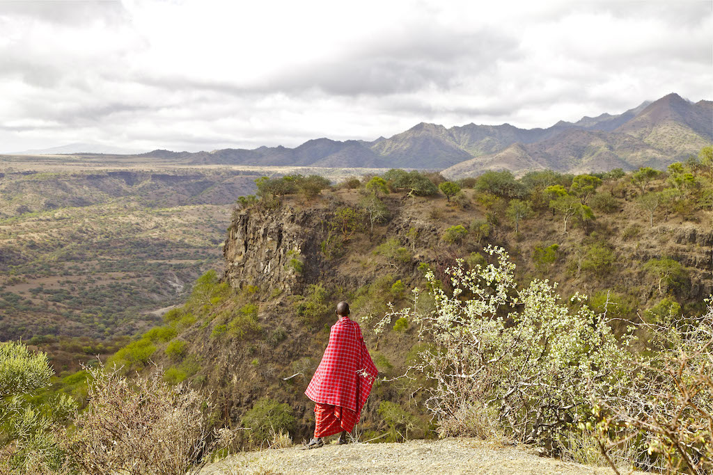A Masai Elder surveying the Great Rift Valley, Tanzania.